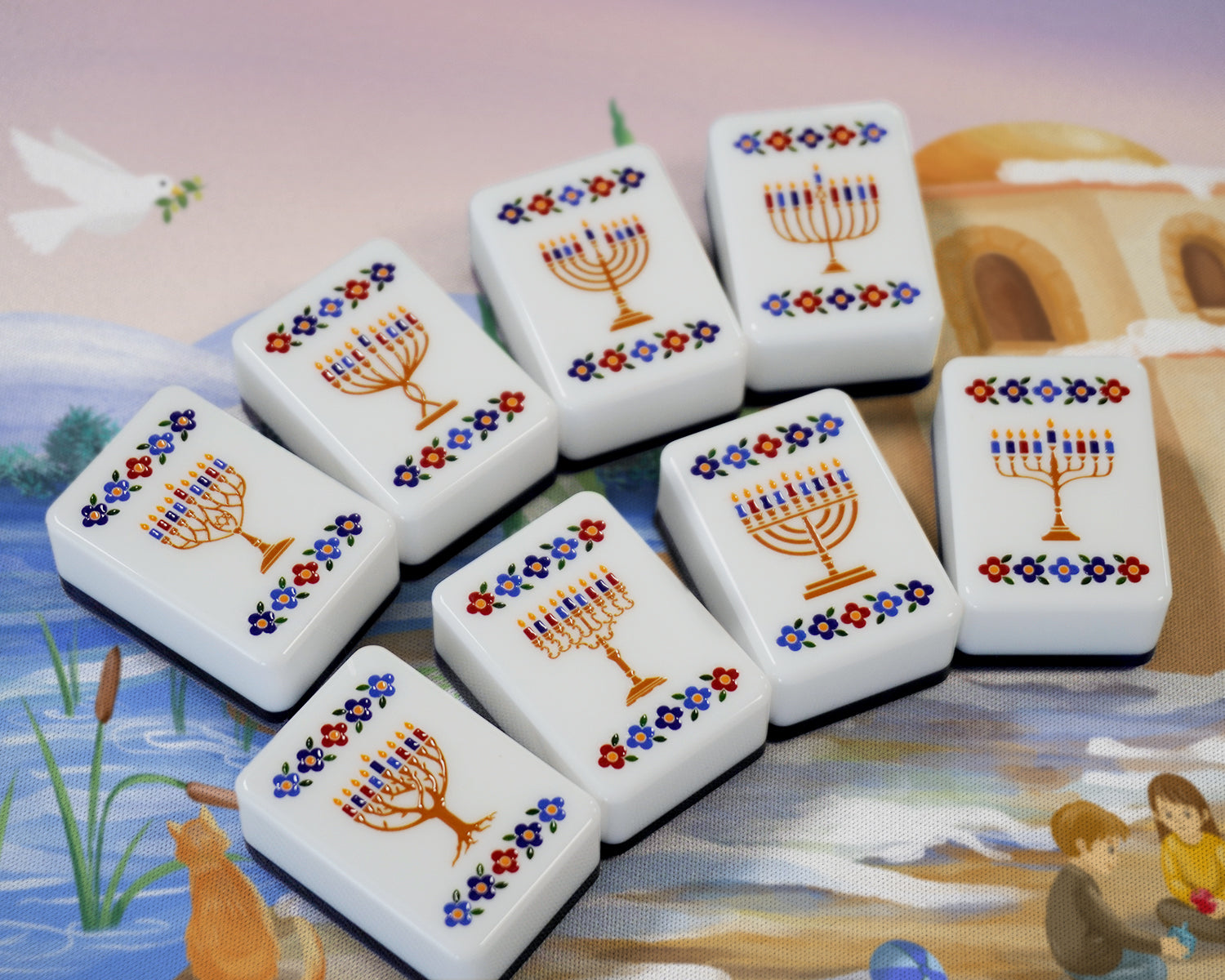 Set of mahjong tiles with Menorah designs on a colorful background