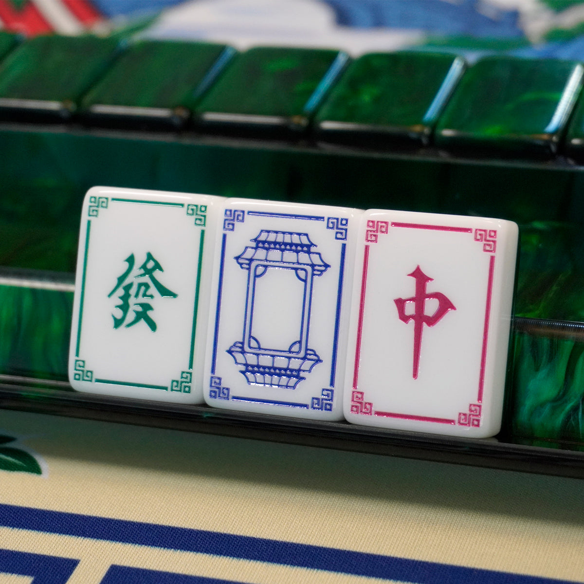 Legacy Emerald Edition dragon tiles on an emerald rack