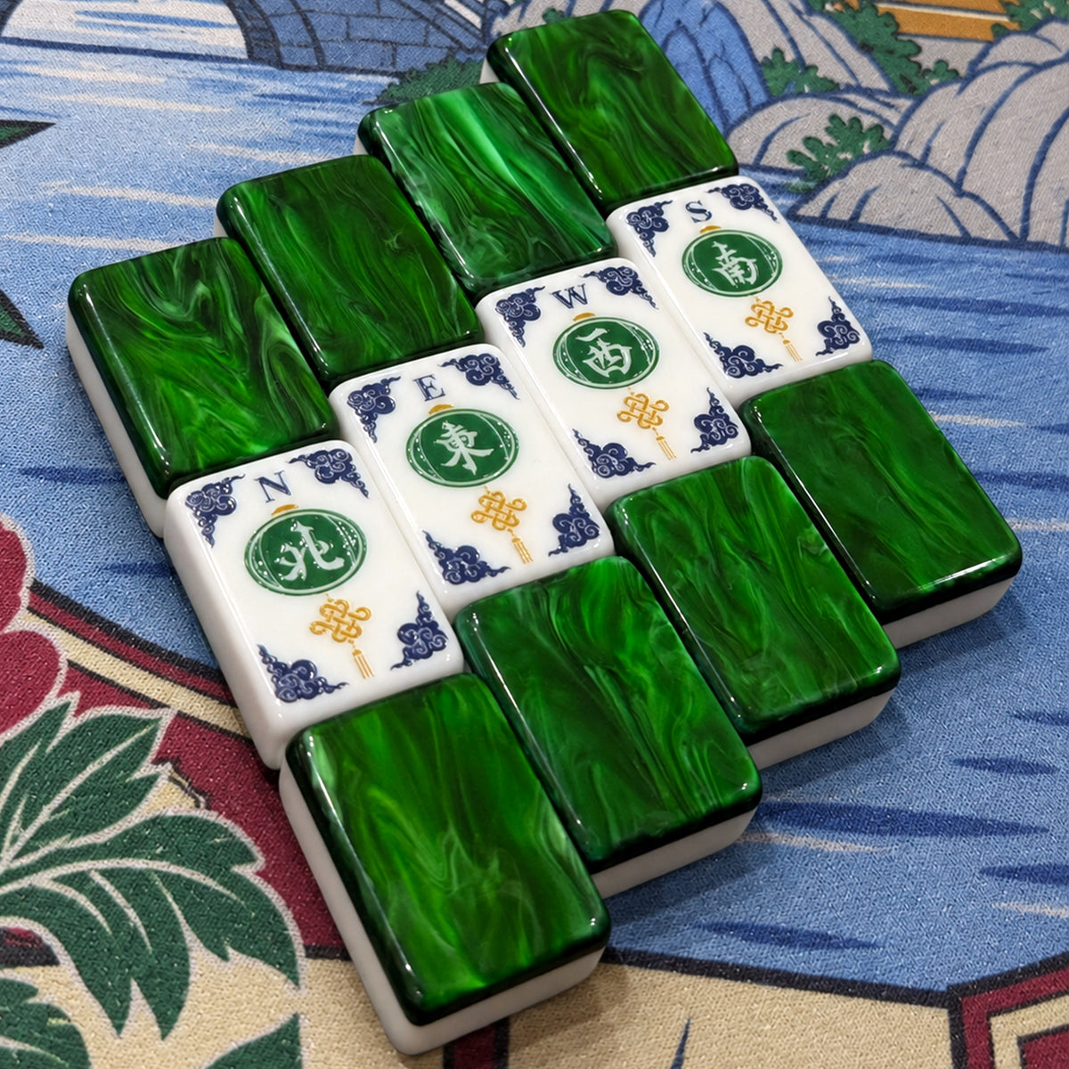 Legacy Emerald Edition wind tiles among emerald-backed tiles