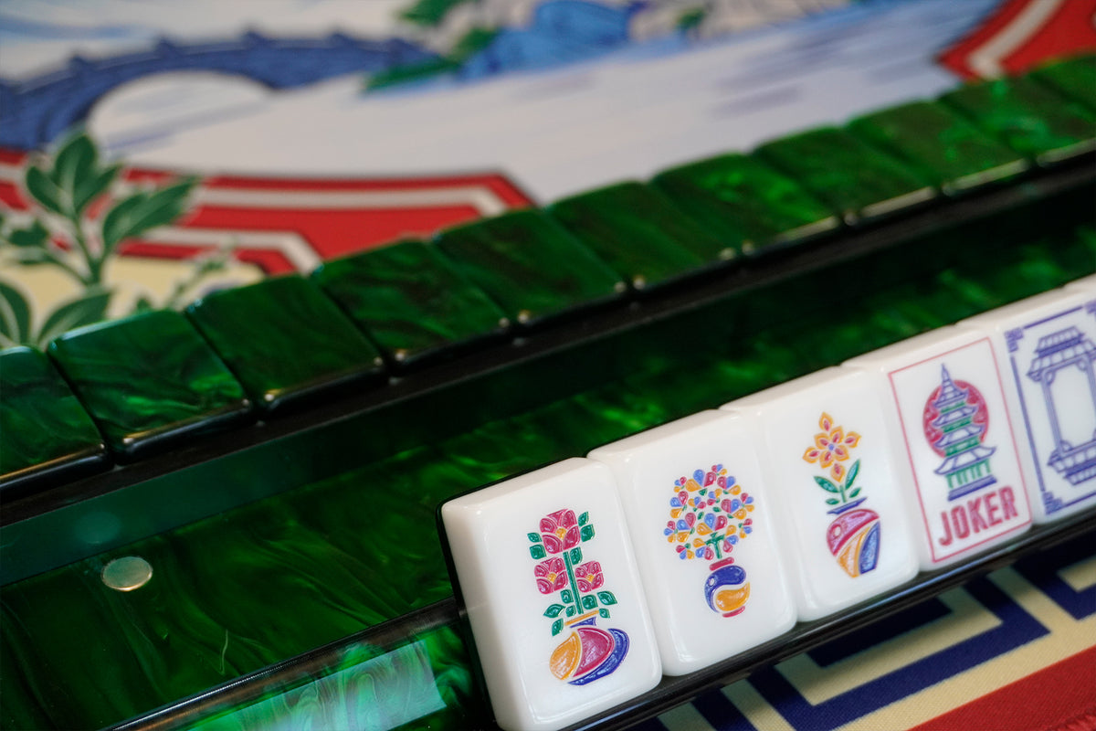 Legacy Emerald Edition tiles on an emerald rack